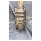 Wood carved old man with bark Back