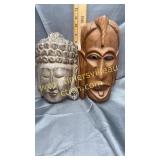 2 wood masks both have ear damage