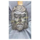 Painted wood carved face