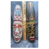 Pair of tall painted wood faces
