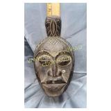 Wood carved tribal face