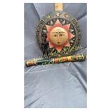 Sun wall hanger, statue and club