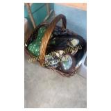 Basket of miscellaneous trays and candle stands