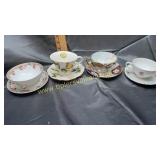 Group of 4 cup and saucers