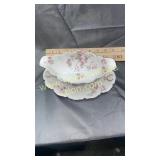 Limoges gravy dish has a small chip