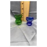 Old eye washers one green one cobalt blue