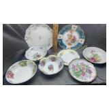 Group of hand painted plates and bowls