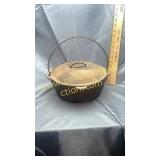 Unmarked Dutch oven with lid and handle