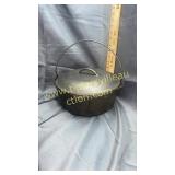 Unmarked Dutch oven with lid and handle