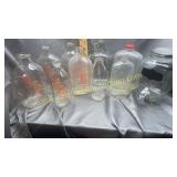 Collection of milk bottles, jugs and jars