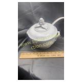 White soup terrine and ladle