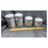 Set of white canisters