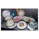 Group of smaller hand painted plates Nippon and