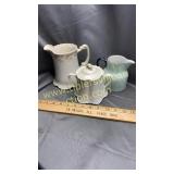 Pitchers and sugar jar