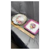 Two hand painted plates