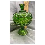 Green moon and star covered candy stand