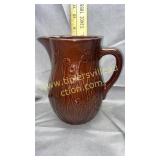 4 brown stoneware flower pitcher