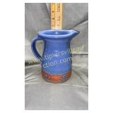 Blue pottery pitcher