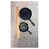 2 cast iron skillets- larger one is Wagner