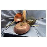 Copper saucepans and skillet