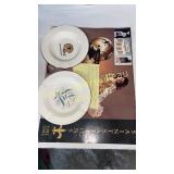 Saints ashtray and dance team calendar with other