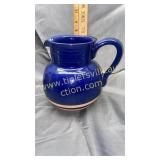 Blue pottery pitcher
