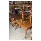 Cherry dining table with 6 chairs and 3 leafs