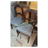 Pair of fruit carved side chairs