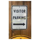 Embossed visitor parking sign
