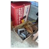 Box of clamps and laser level