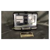 Vintage travel alarm clock radio