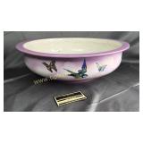 Large antique bird wash basin has crack