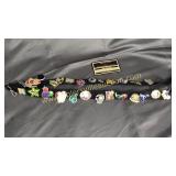 25 Disney world collector pins on lanyard