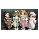 Lot of 4 porcelain dolls