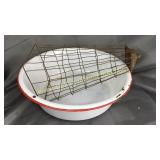 Red and white enamel ware dish pan and wire piece