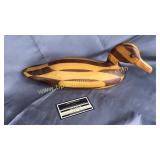Hand crafted basswood and walnut duck v. Canfield