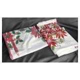 2 vintage Christmas table cloths