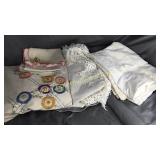 Hand made table cloths on aluminum platter