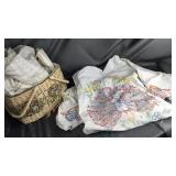 Basket of vintage hand done clothes