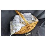 Basket of vintage tablecloths, pillow, linens-