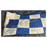 Hand embroidered bird quilt-edges are tattered