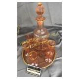 Pink depression and gold decanter, cordials on