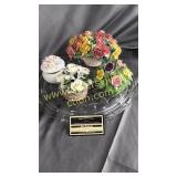 Porcelain flowers on cake plate