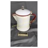 Red and white enamel ware percolator