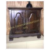 cherry small cabinet full of movies28"X27"