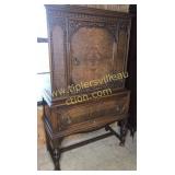 beautiful burl front cabinet with carved base