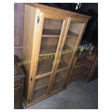 Oak dbl door bookcase 34x60"