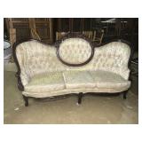 Ornate parlor sofa w/ tall back & detail carving