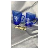 Pair of cobalt Shirley temple cream pitchers