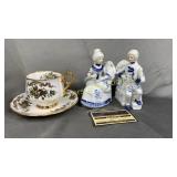 Bone China cup and saucer with figurines